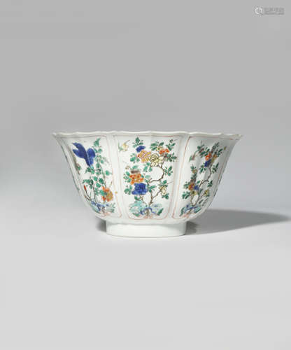 A CHINESE FAMILLE VERTE 'BIRDS AND FLOWERS' MOULDED BOWL