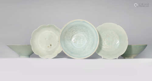 FOUR CHINESE QINGBAI BOWLS AND A DISH