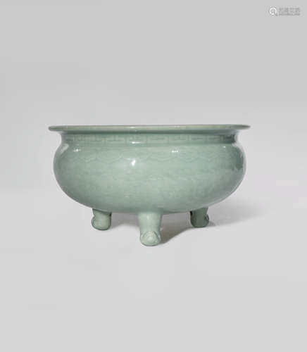 A CHINESE CELADON TRIPOD INCENSE BURNER