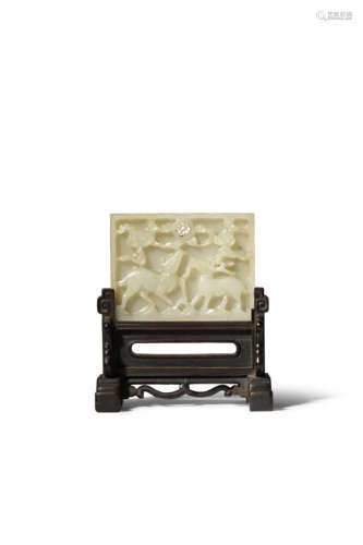 A CHINESE CELADON JADE RECTANGULAR PLAQUE