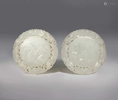 A PAIR OF CHINESE WHITE JADE CIRCULAR 'SI JUN ZI' PLAQUES