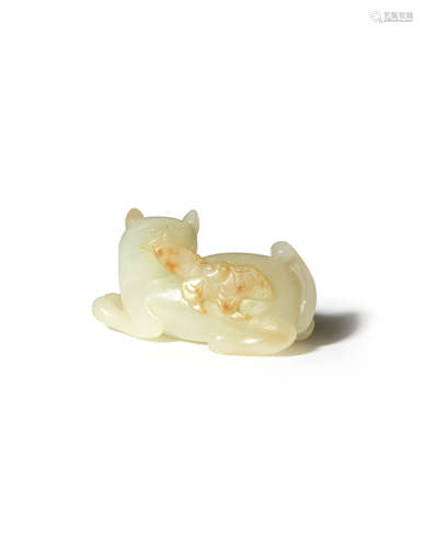 A CHINESE PALE CELADON JADE CARVING OF A CAT AND BUTTERFLY