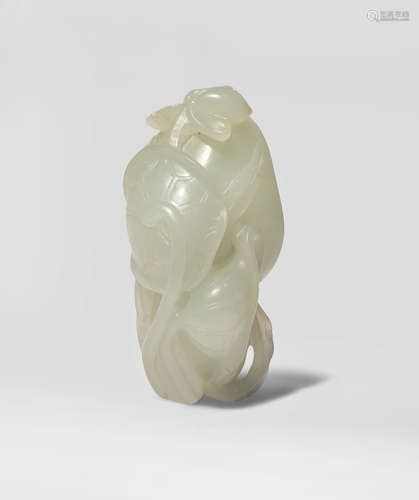 A CHINESE PALE CELADON JADE CARVING OF LOTUS SEED PODS