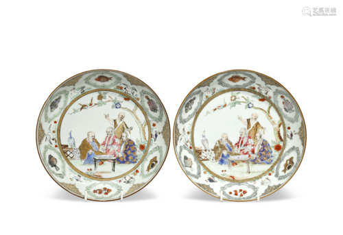 A PAIR OF RARE CHINESE FAMILLE ROSE 'DOCTOR'S VISIT' SAUCER DISHES