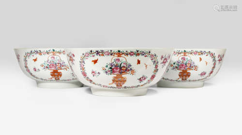 A SET OF THREE CHINESE FAMILLE ROSE BOWLS