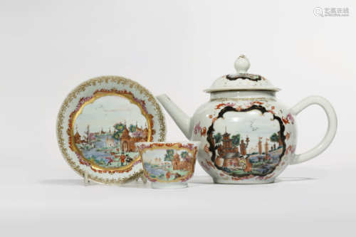 A CHINESE TEAPOT AND COVER AND A TEA BOWL AND SAUCER