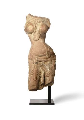 AN INDIAN RED SANDSTONE TORSO OF A DEVATA