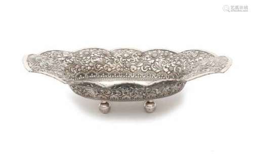 An oval Djokja silver basket, decorated with flowers and peacocks. Indonesia, 20th century.Length 41