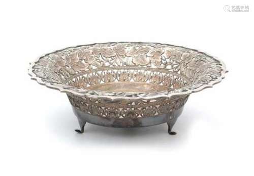 A pierced Djokja bowl with floral decoration. 20th century.Diameter 24 cm- - -29.00 % buyer's