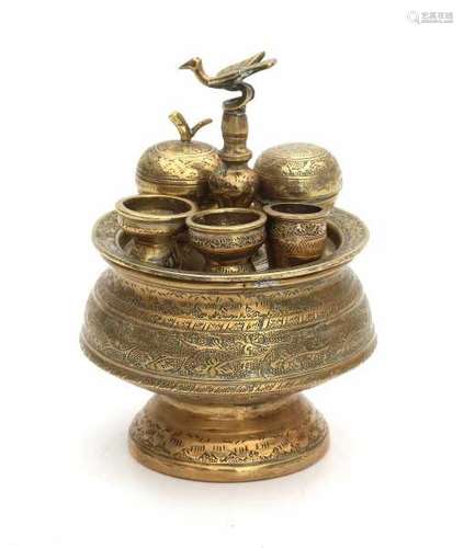 A miniature brass sirih set. 20th centuryheight 12,5 cm.- - -29.00 % buyer's premium on the hammer