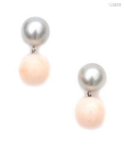 A pair of white gold earrings, set with a cultured Tahiti pearl, diameter ca. 11.2 mm and