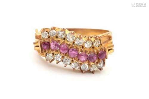 Yellow gold ring set with fourteen old cut diamonds and eight rubies. Ring size: 17/54. Gross