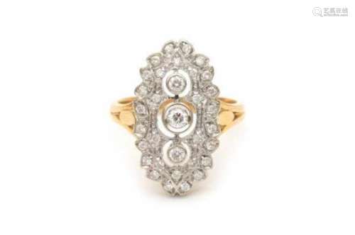 18 carat gold navette shaped ring set with brilliant cut diamonds. Total ca. 0.70 ct. Yellow gold