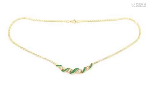 An 18 carat yellow gold necklace. The center is set with baguette and step cut emeralds, total ca.