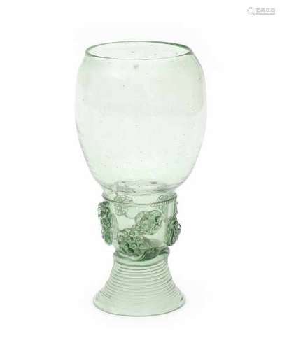 A German wine glass 'Roemer'. 17th centuryheight 13,5 cm.- - -29.00 % buyer's premium on the