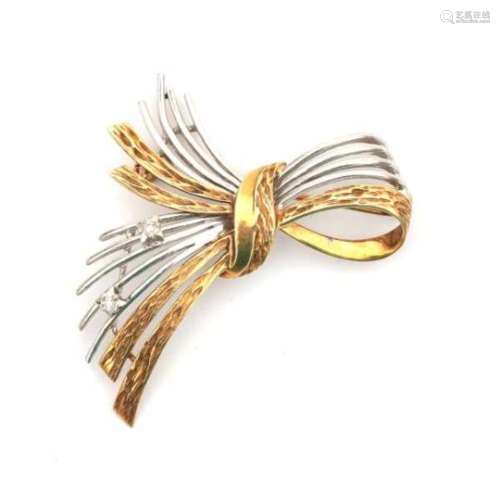 14 carat two tone spray brooch, made in yellow and white gold. Sixties spray design of a bundle or