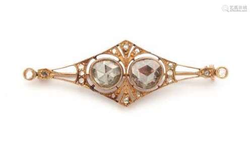 A 14 carat yellow gold brooch from the 19th century. Set with rose cut diamonds. The two largest