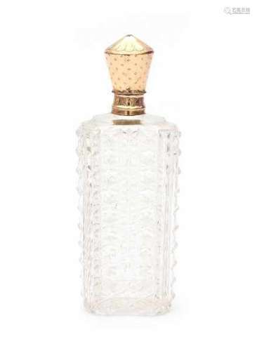 A crystal perfume bottle with a 14 carat rose gold cap in original leather case from the 19th