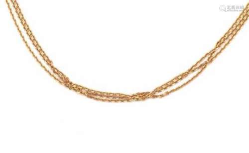 An 18 carat yellow gold three strand anchor type link chain necklace by Chopard. Length ca. 45 cm.