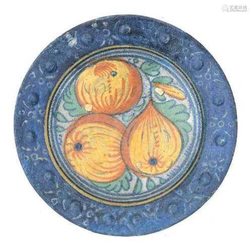 A Dutch maiolica 'pomegranate' plate, the rim decorated with studs. Late 16th centuryDiameter 20