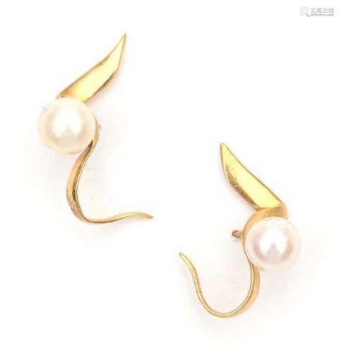 A pair of yellow gold earrings by Paloma Picasso for Tiffany & Co, 1983. Set with cultured pearls