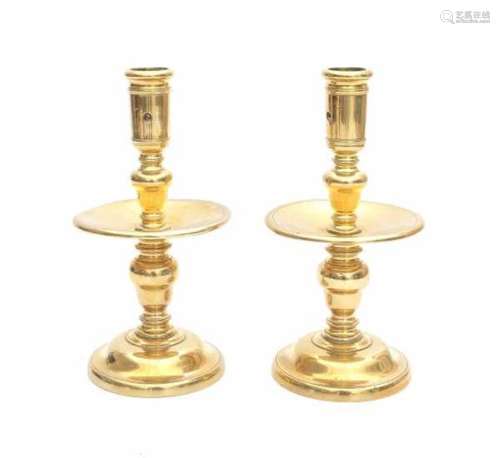 A pair of Dutch bronze candlesticks. 17/18th centuryheight 24 cm.- - -29.00 % buyer's premium on the