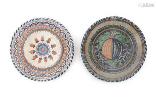 Two Dutch maiolica pomegranate chargers. 17th centuryDiameter 32 and 33 cm.- - -29.00 % buyer's