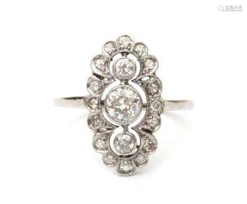 A white gold princess ring, made early 20th century. Set with old-European and single cut