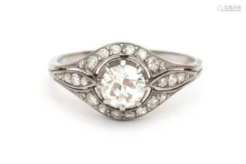 A white gold Art Deco ring, set with brilliant and single cut diamonds. Central diamond is ca. 0.