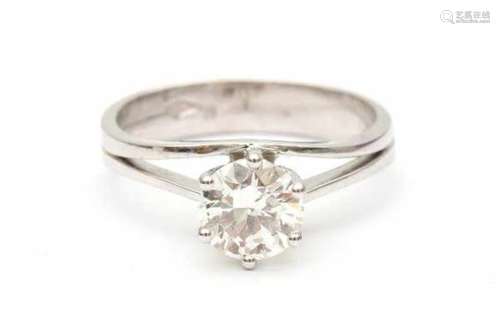 An 18 carat white gold solitaire ring. Set with a brilliant cut diamond, ca. 1.24 ct, ca. P1 and