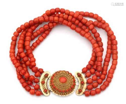 A five strand precious coral necklace with a rose gold clasp. Strings have graduating length, ca. 36