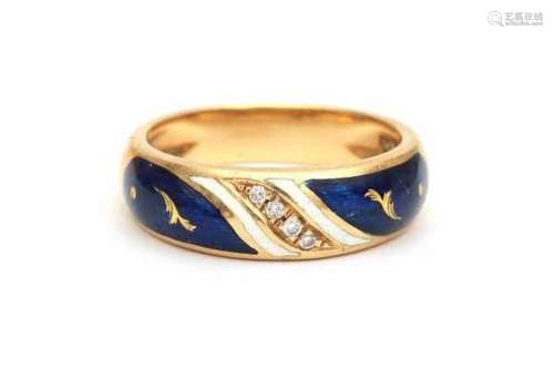 An 18 carat yellow gold ring, Victor Mayer for Fabergé, edition 80/300. Adorned with blue and