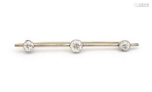 A yellow and white gold bar brooch, set with three old-European Diamonds, total ca. 1.20 ct, ca.