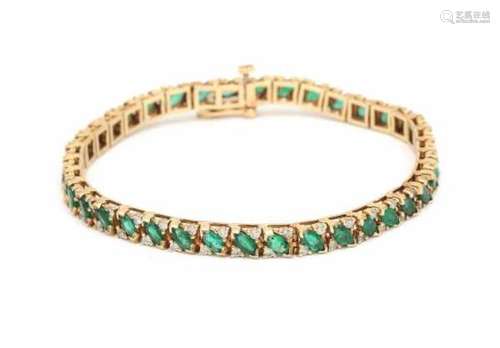 A yellow gold rivera bracelet. set with marquise cut emeralds, total ca. 2.66 ct, and brilliant