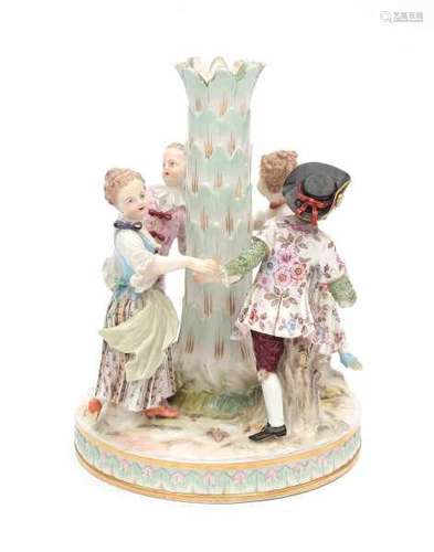 A base of a porcelain centerpiece, a group of dancers around a palm tree. Marked with crossed