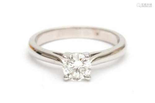 A white gold diamond solitaire ring, set with a brilliant cut diamond of ca. 0.72 ct, ca. P, G-H.