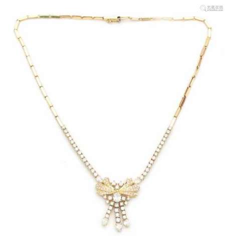 18 carat gold diamond necklace, set with brilliant, oval and pear cut diamonds. Center in a ribbon