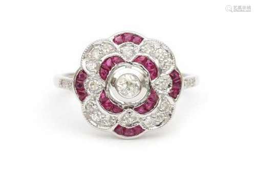 14 carat white gold diamond and ruby cluster ring. Set with single cut and an old mine cut diamond