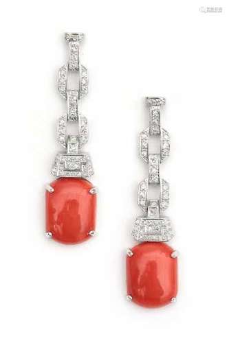 18 carat white gold diamond and coral earrings. Geometrical designed stud earrings set with single