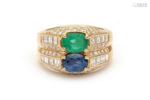 18 carat yellow gold cocktail ring set with an oval cut faceted sapphire and a oval cut faceted