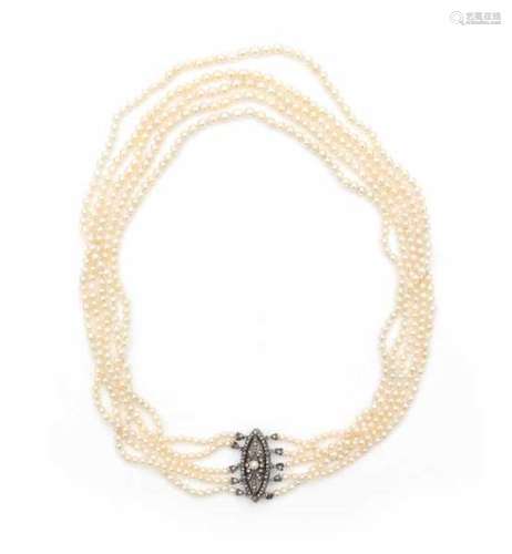 Antique seed pearl necklace with a rose cut diamond clasp, with five strands of seed pearls.