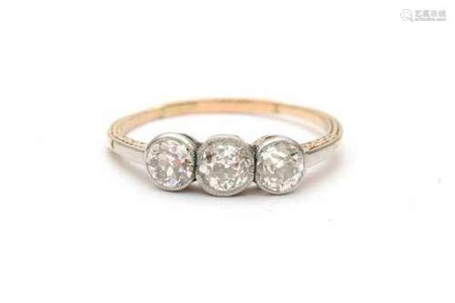 Gold and platinum diamond Belle Epoque ring, with three old European cut diamonds: . 1 x 0.33 ct.,