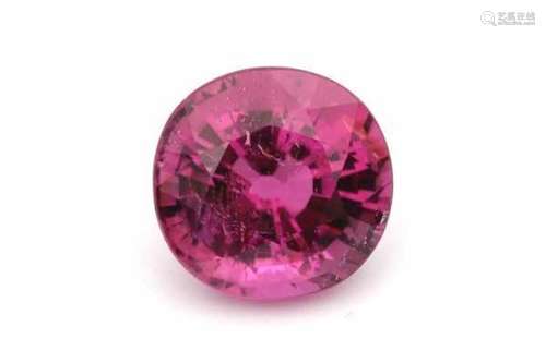 An oval cut pink reddish rubellite tourmaline, ca. 7.78 ct. In original parcel paper. Dimensions: