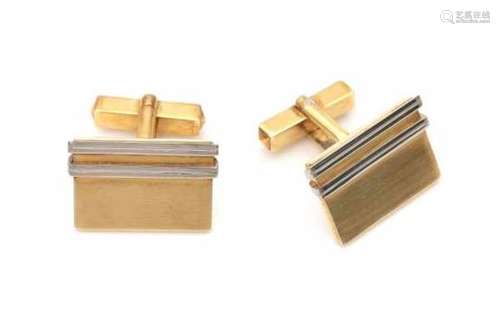 A pair of two tone 14 carat gold cuff links, rectangular model, brushed yellow gold with white