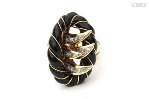 18 carat gold cocktail ring with onyx and diamond. Designed as a rope of onyx with gold wire and a