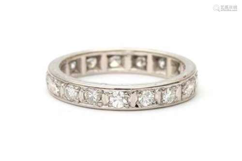 Platinum eternity band, set with seventeen 0.06 ct. brilliant cut diamonds, ca. I-J/ Vs2. Total: 1.