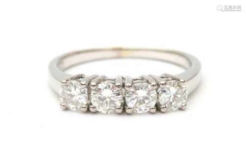 18 carat white gold diamond half eternity band, set with four brilliant cut diamonds of 0.20 ct.