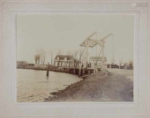 Ten mounted photographs of various cities i.a. Amsterdam (Paleis van Volksvlijt), Dordrecht and