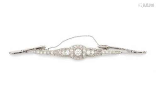 14 carat white gold Art Deco bracelet set with diamonds. Geometrical design set with an old