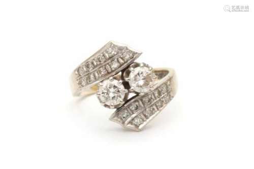 14 carat white gold diamond 'you & me' or 'toi et moi' ring set with two briljant cut diamonds of